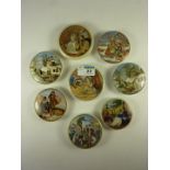 Eight small Victorian Prattware pot lids, 'Dutch Winter Scenes' and seven others.