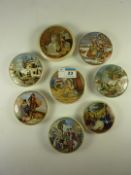 Eight small Victorian Prattware pot lids, 'Dutch Winter Scenes' and seven others.