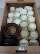 Large quantity of pot lid bases and various pot lid frames.