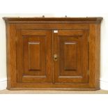 19th century golden oak wall hanging corner cupboard fitted with lion mask handle, W108cm,