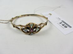 Edwardian hinged bangle set with ruby and opals stamped 9ct