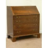 George III oak and mahogany banded fall front bureau above four graduating drawers,