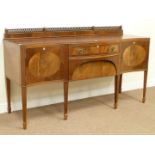 Early 20th century Recency style sideboard fitted with two cupboards either side,