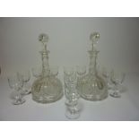 Pair Edwardian cut crystal decanters H24cm and a set of 12 liqueur glasses