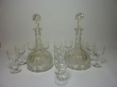 Pair Edwardian cut crystal decanters H24cm and a set of 12 liqueur glasses