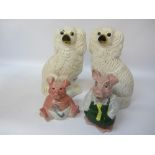 Two Wade Nat West pigs and a pair Staffordshire dogs