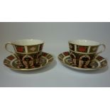 Pair of Royal Crown Derby tea cups and saucers, pattern no.