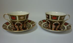 Pair of Royal Crown Derby tea cups and saucers, pattern no.