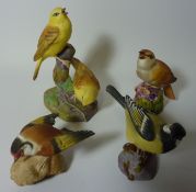 Four Royal Worcester bird sculptures 'Yellow Hammers', 'Nightingale',