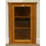 Cherry wood corner cabinet enclosed by single glazed door fitted two shaped shelves by Geoff