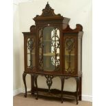 Late Victorian mahogany breakfront display cabinet, centre cupboard enclosed by glazed door and