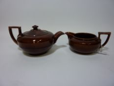 Rockingham brown-glazed teapot with jug,