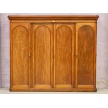 Fine quality Victorian figured mahogany wardrobe, four arched top panelled doors,
