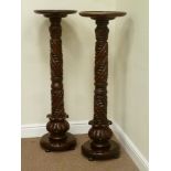 Pair early 20th century mahogany turned and carved baluster jardiniere stands with circular top,