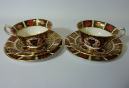 Pair of Royal Crown Derby trios, pattern no.