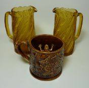 Treacle glaze frog mug H10cm and a pair of amber glass jugs (3)