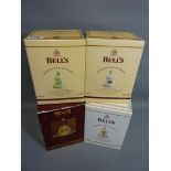 Four limited edition Bells Christmas Scotch Whisky decanters 1996, 2007, 2008,