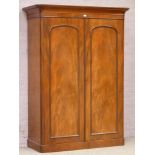 Victorian figured mahogany double wardrobe fitted with linen trays, drawers and hanging space,