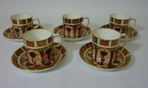 Set of five Royal Crown Derby coffee cans and saucers, pattern no.