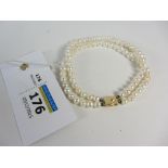 Double row pearl bracelet the clasp stamped 750