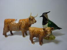 Beswick Highland cow and calf, and a Beswick Lapwing (3) Condition Report Cow's horn has been