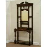 Edwardian oak hallstand fitted with bevelled edge centre mirror and single glove drawer,