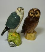 Two Royal Doulton decanters -  'Merlin' and 'Tawny Owl'