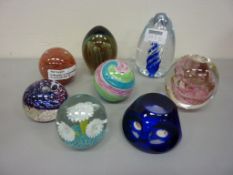 Eight assorted decorative paperweights