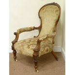 Victorian carved walnut framed upholstered spoon back armchair,