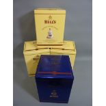 Four limited edition Bells Christmas Scotch Whisky decanters 2003, 2004,2005,