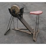 A treadle grindstone with seat G