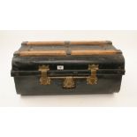 A tin trunk or steamer case with brass c