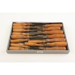 A user set of 17 bevel edge chisels all