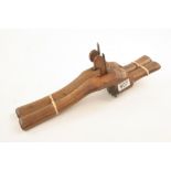 A pair of pistol grip beech routers by T