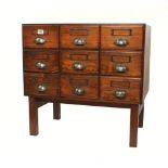A small pine 9 drawer chest ideal for ch