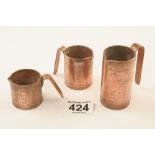 Three copper spirit measures dated 1888