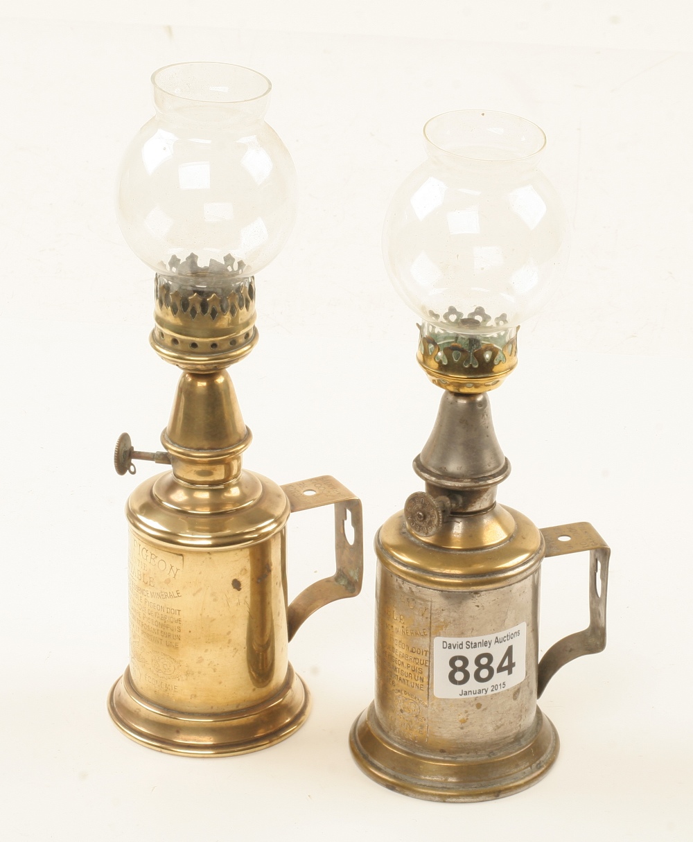 A pair of French pigeon lamps with glass