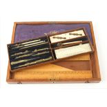 A set of brass drawing instruments by ST