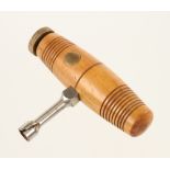 A PRESTON boxwood and brass bit holder c