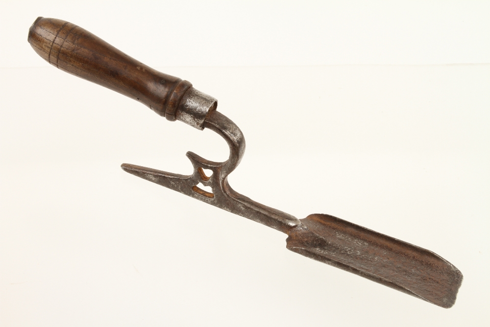 An 18c farriers buttress with pierced de