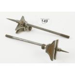 A pair of steel trammel heads with 81/2" steel points by L S STARRETT G+