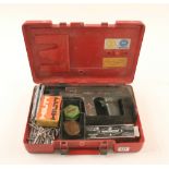 A HILTI nail gun in orig case