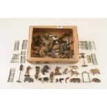 A quantity of toy soldiers and lead zoo animals