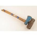 A sledge hammer and a splitting axe