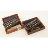 Two sets of drawing instruments in mahogany boxes G