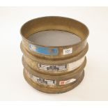 Three brass laboratory test sieves 63,