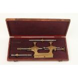 A Swiss clockmakers "Tour a Pivoter" brass lathe in orig box G+