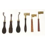 Three adjustable brass powder measures and three early gun keys with ebony handles G+