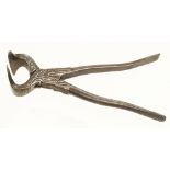 A rare pair of 17/18c French iron pincers with extended jaw on one side and engraved decoration to