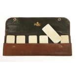 A very rare set of 6 piano tuners ivory wedges in fitted leather case F